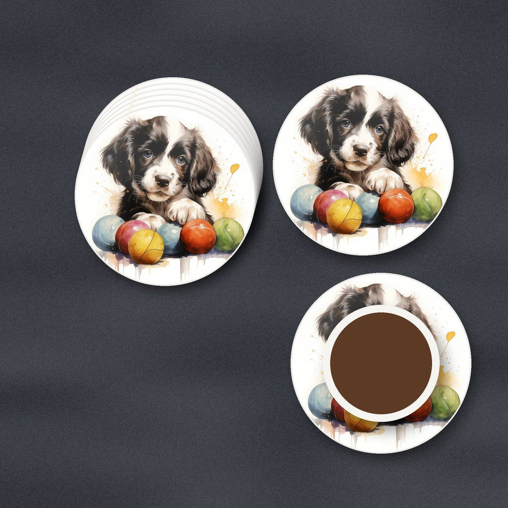 Springer Spaniel Puppy with Balls round ceramic coasters stacked on a slate kitchen worktop