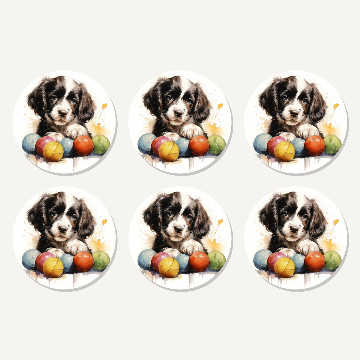 Flat lay of the springer spaniel puppy with balls artwork on six round coasters