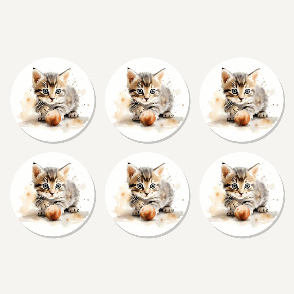 Flat lay of the tabby kitten with ball artwork on six round coasters