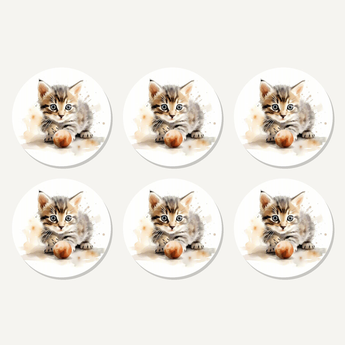 Flat lay of the tabby kitten with ball artwork on six round coasters