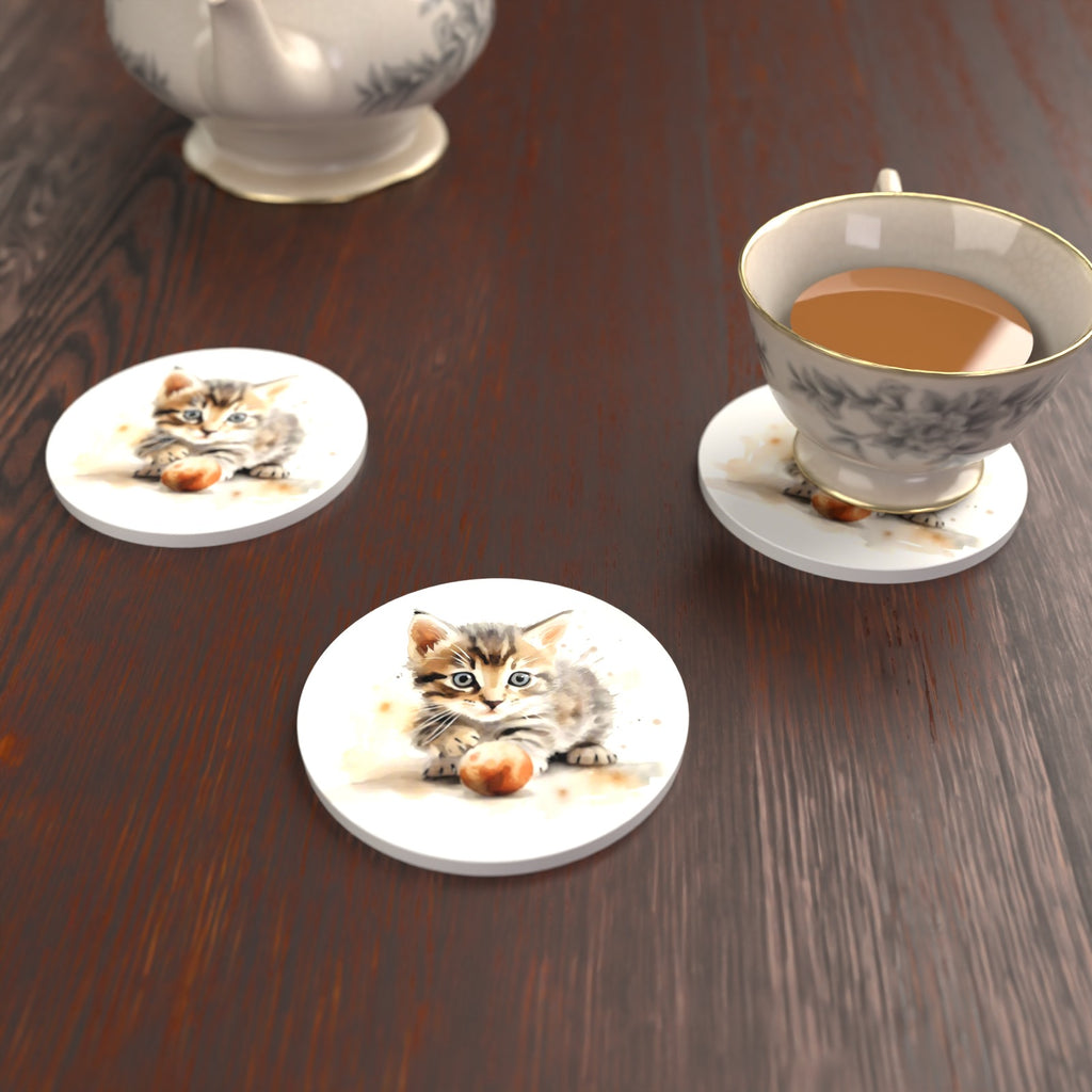 Tabby Kitten with Ball Round Ceramic Coasters – Set of 6 – lifestyle mockup with a teacup