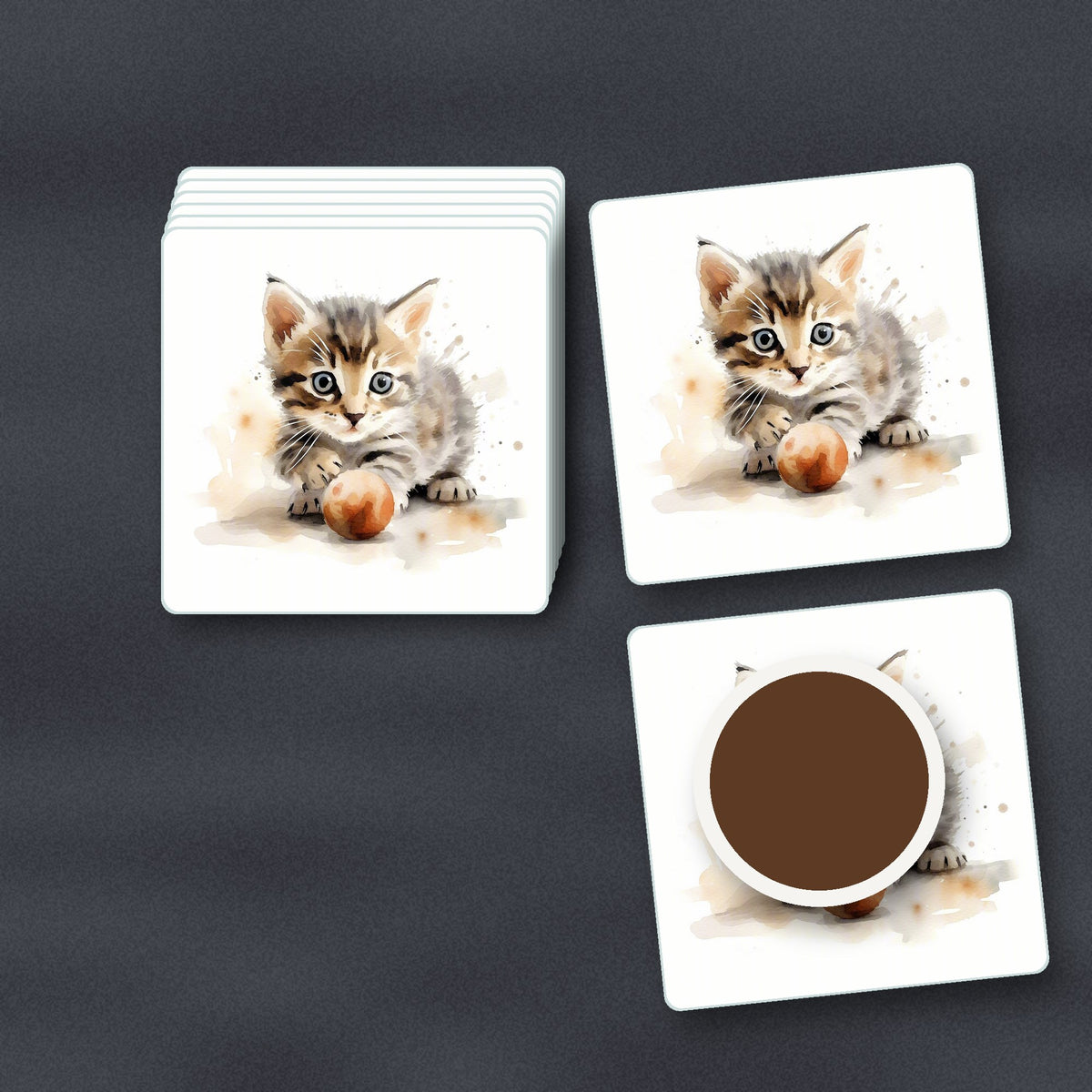 Tabby Kitten with Ball square glass coasters stacked on a slate kitchen worktop