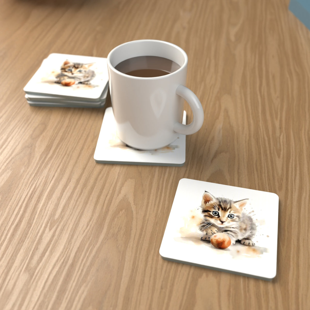 Tabby Kitten with Ball Square Glass Coasters – Set of 6 – lifestyle mockup with a mug of coffee