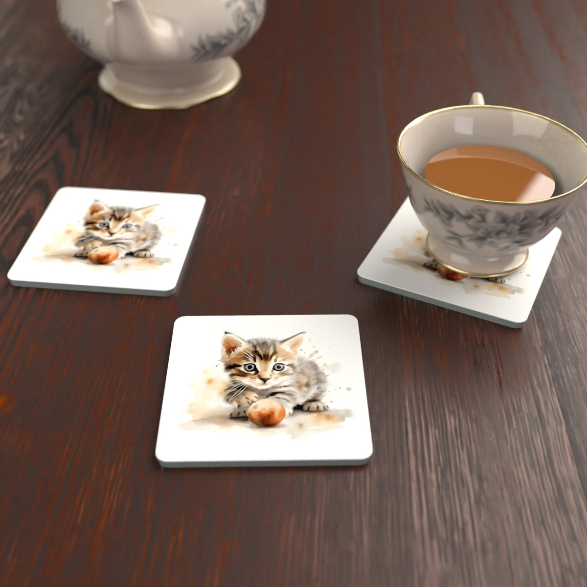 Tabby Kitten with Ball Square Glass Coasters – Set of 6 – lifestyle mockup with a teacup