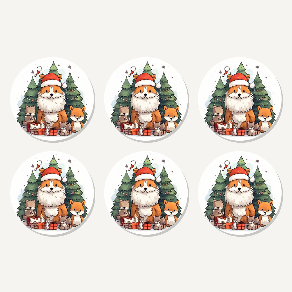 Flat lay of the christmas fox & woodland friends artwork on six round coasters