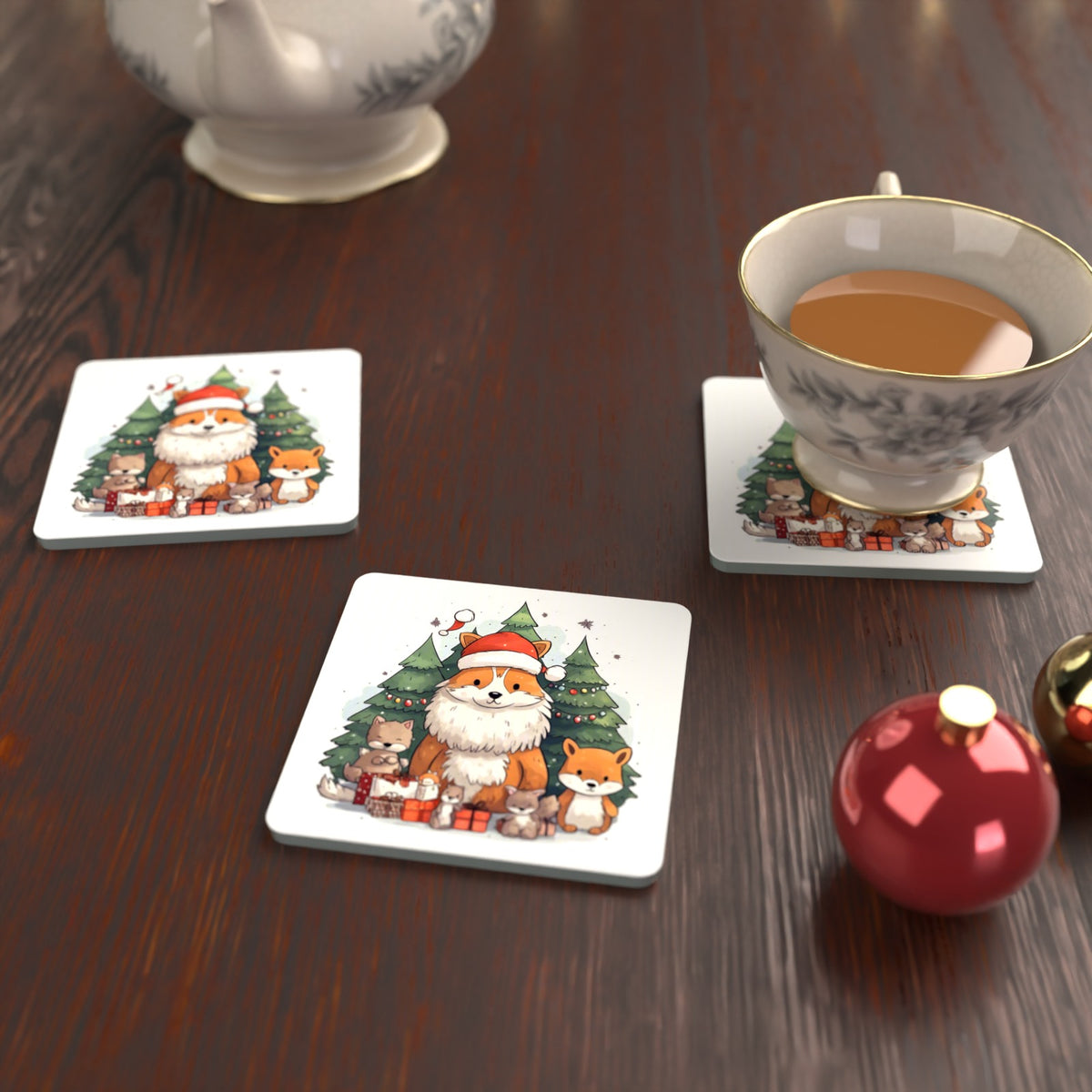 Christmas Fox & Woodland Friends Square Glass Coasters – Set of 6 – lifestyle mockup with a teacup