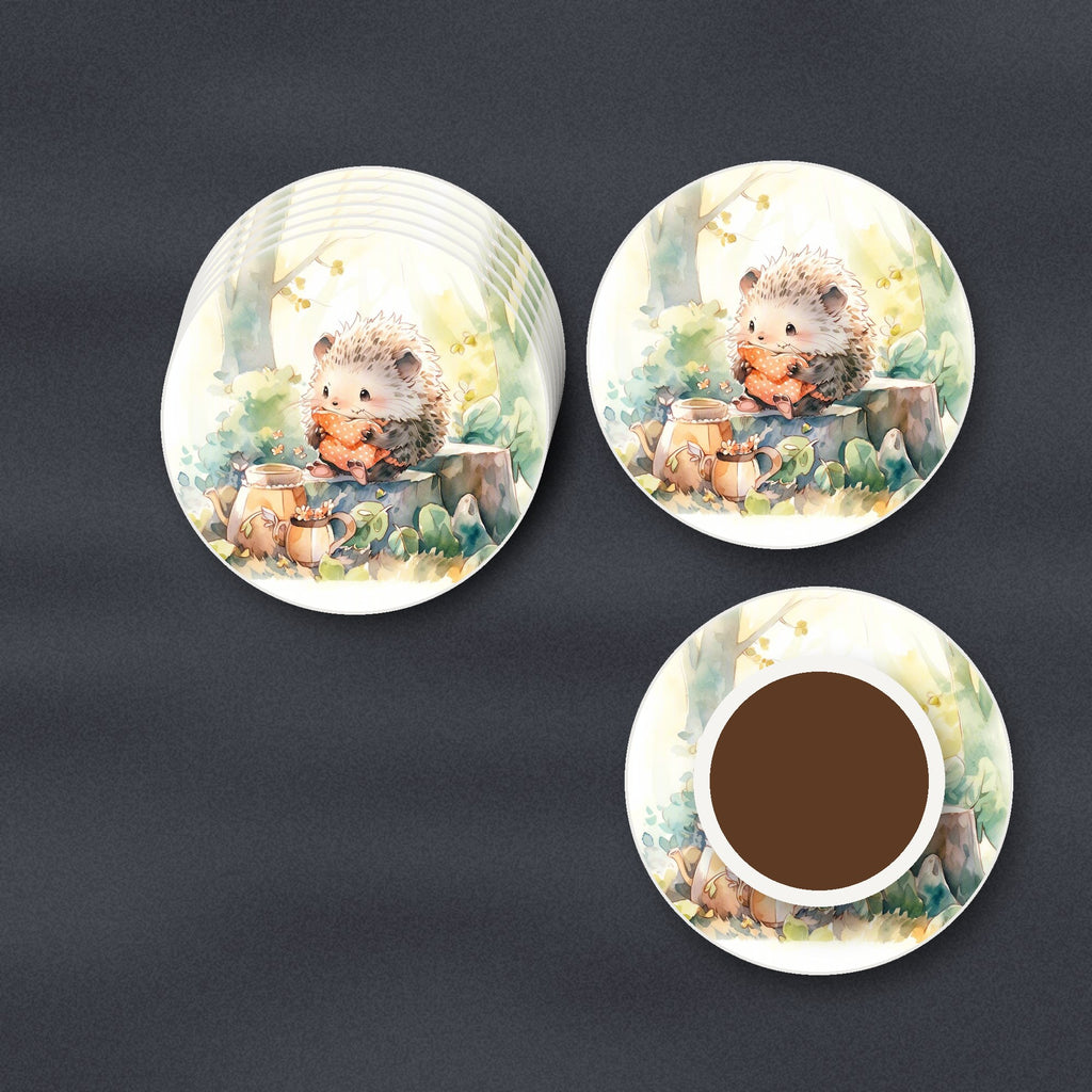 Watercolour Woodland Hedgehog round ceramic coasters stacked on a slate kitchen worktop