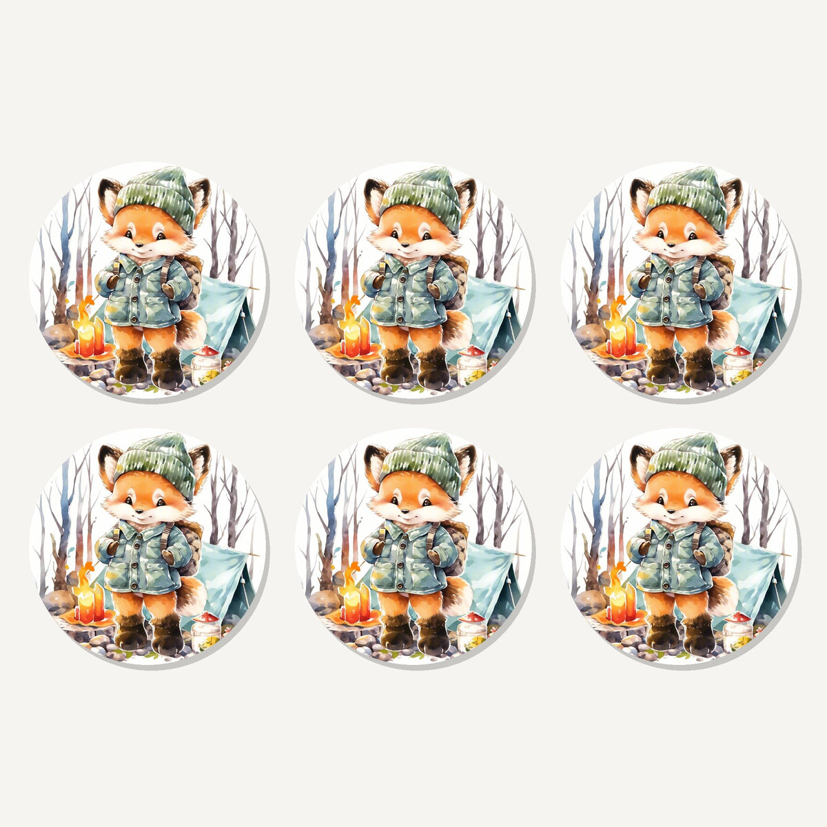 Flat lay of the fox camping watercolour artwork on six round coasters