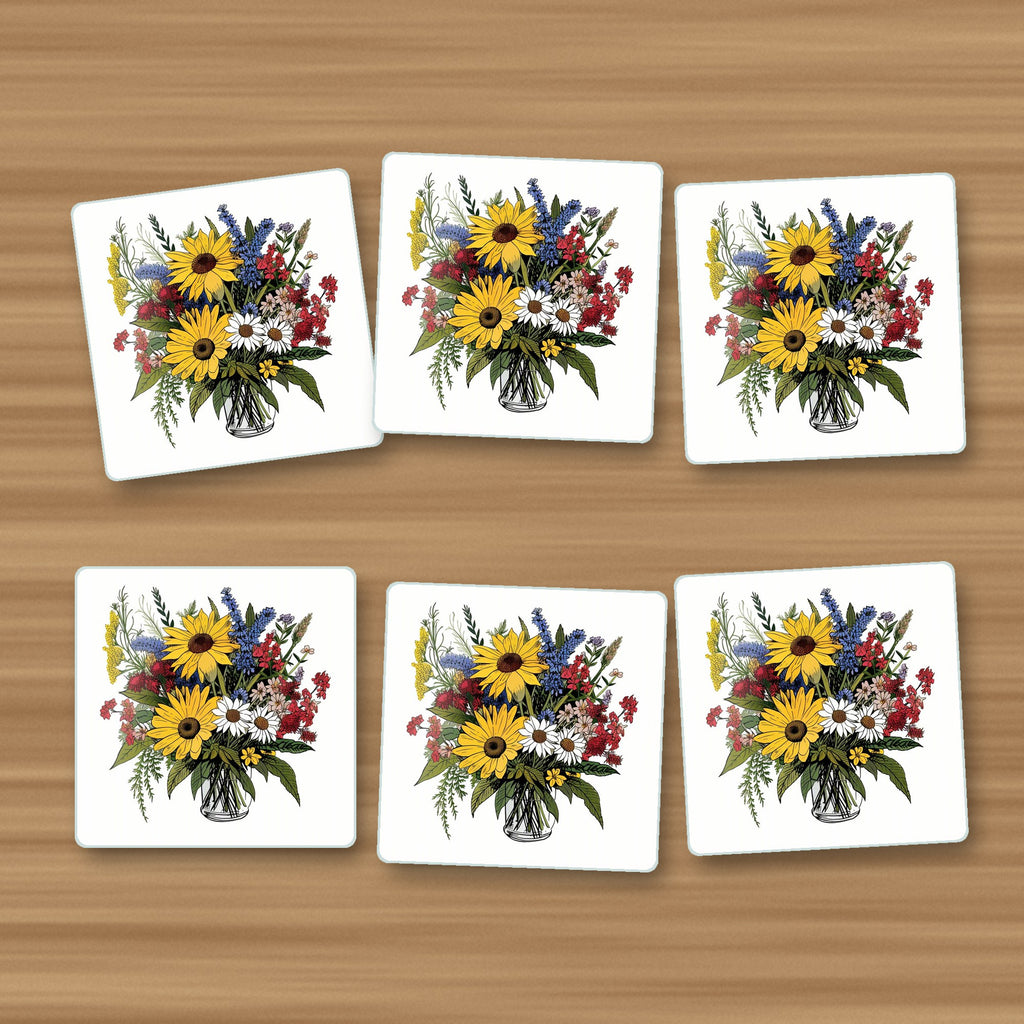 Sunflower & Wildflower Bouquet square glass coasters, set of 6, on an oak coffee table