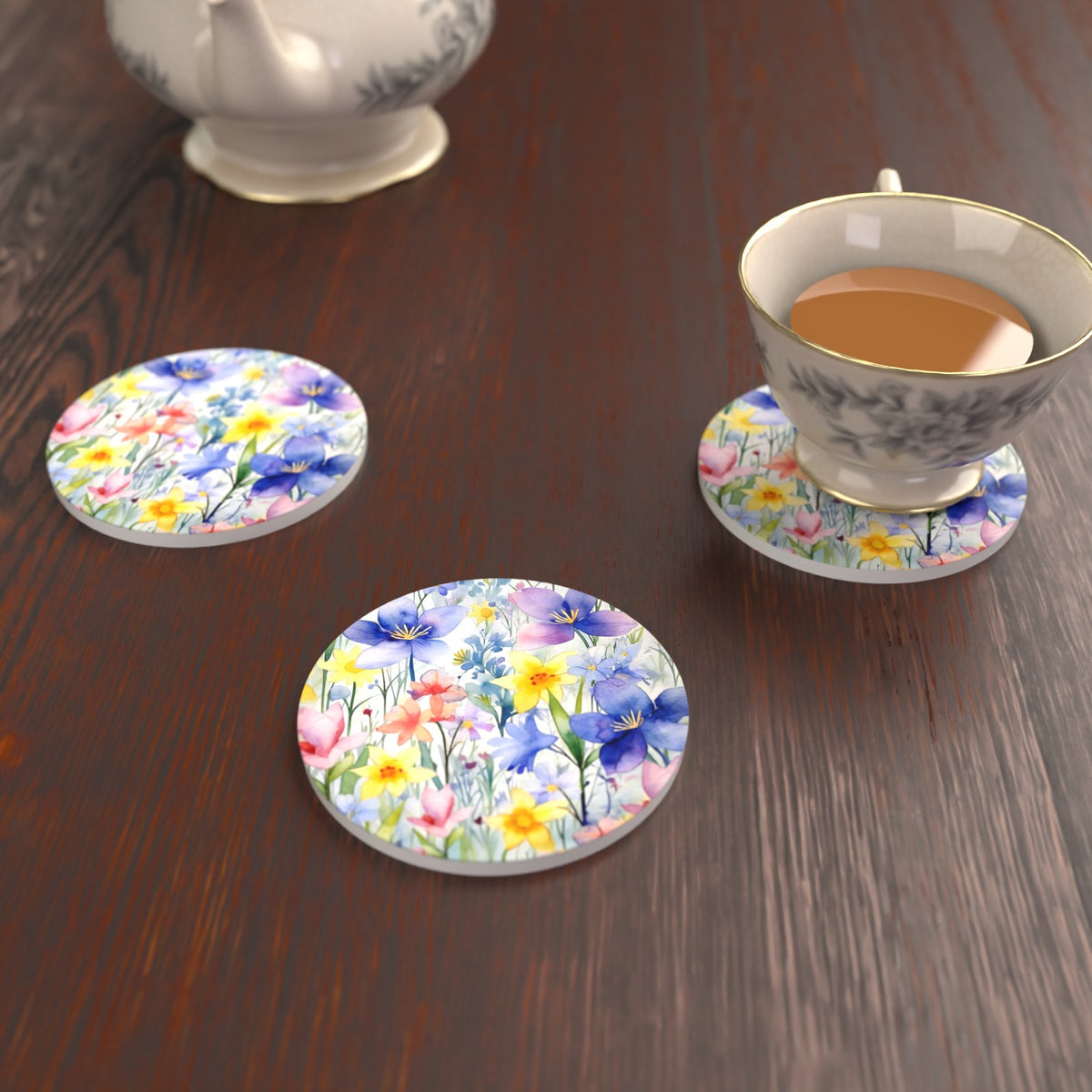 Watercolour Spring Flowers Round Ceramic Coasters – Set of 6 – lifestyle mockup with a teacup