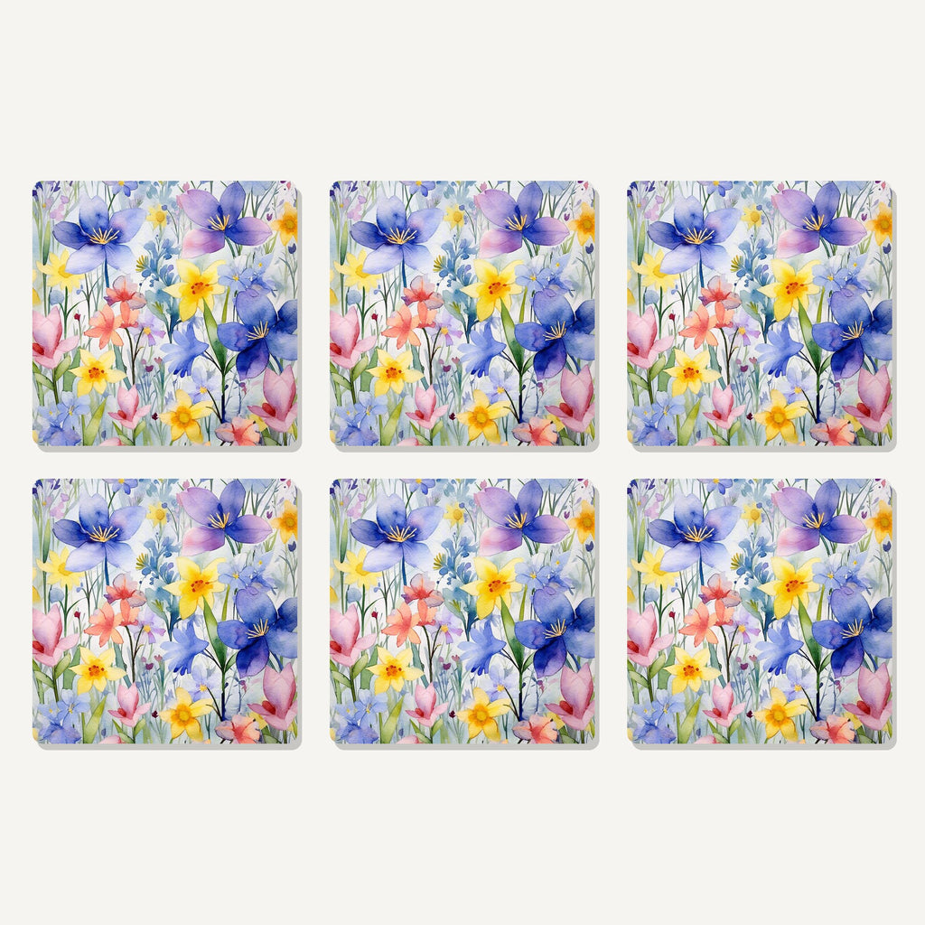 Flat lay of the watercolour spring flowers artwork on six square coasters