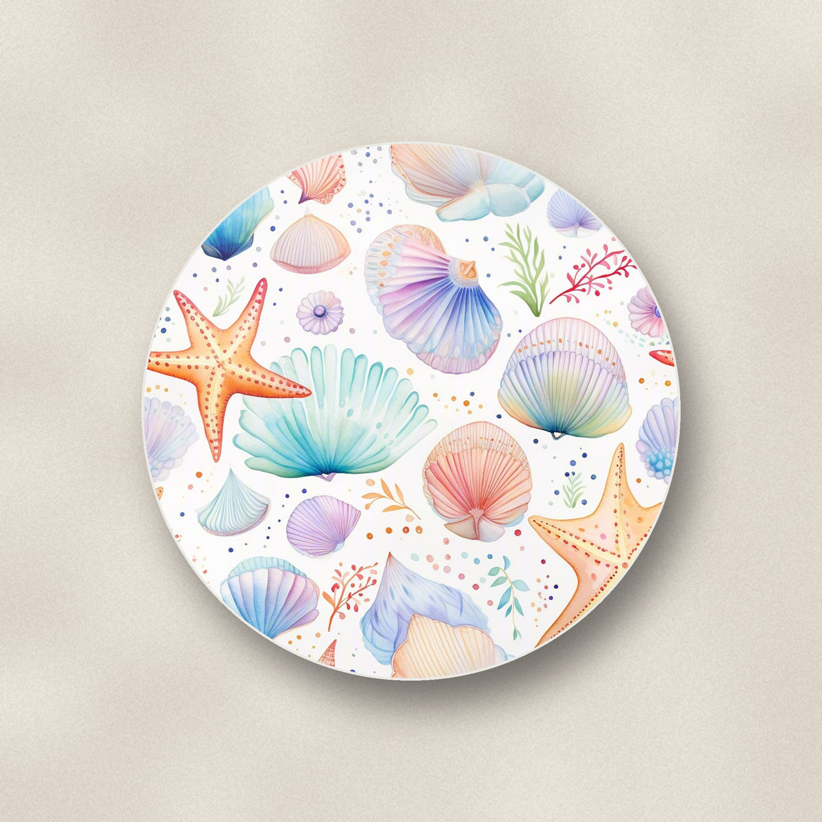 Close-up of one watercolour seashells & starfish round ceramic coaster, flat UV print