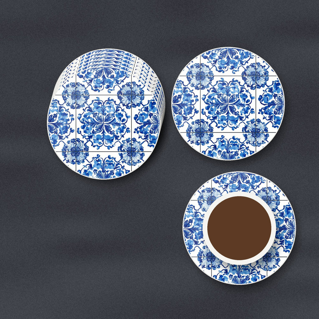 Blue & White Floral Tile round ceramic coasters stacked on a slate kitchen worktop