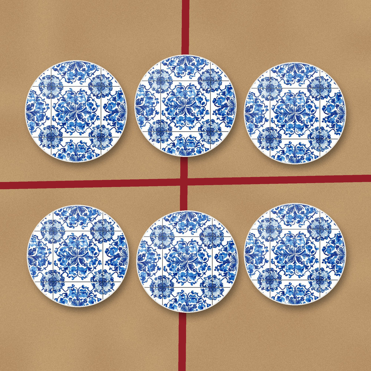 Blue & White Floral Tile round ceramic coasters on kraft gift wrap