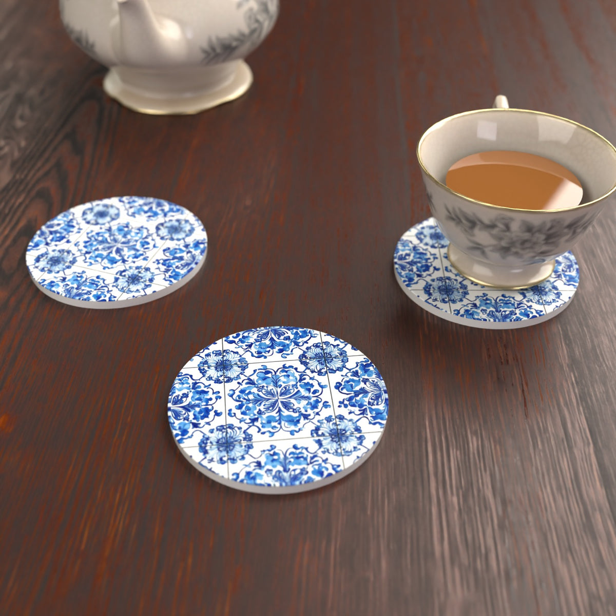 Blue & White Floral Tile Round Ceramic Coasters – Set of 6 – lifestyle mockup with a teacup