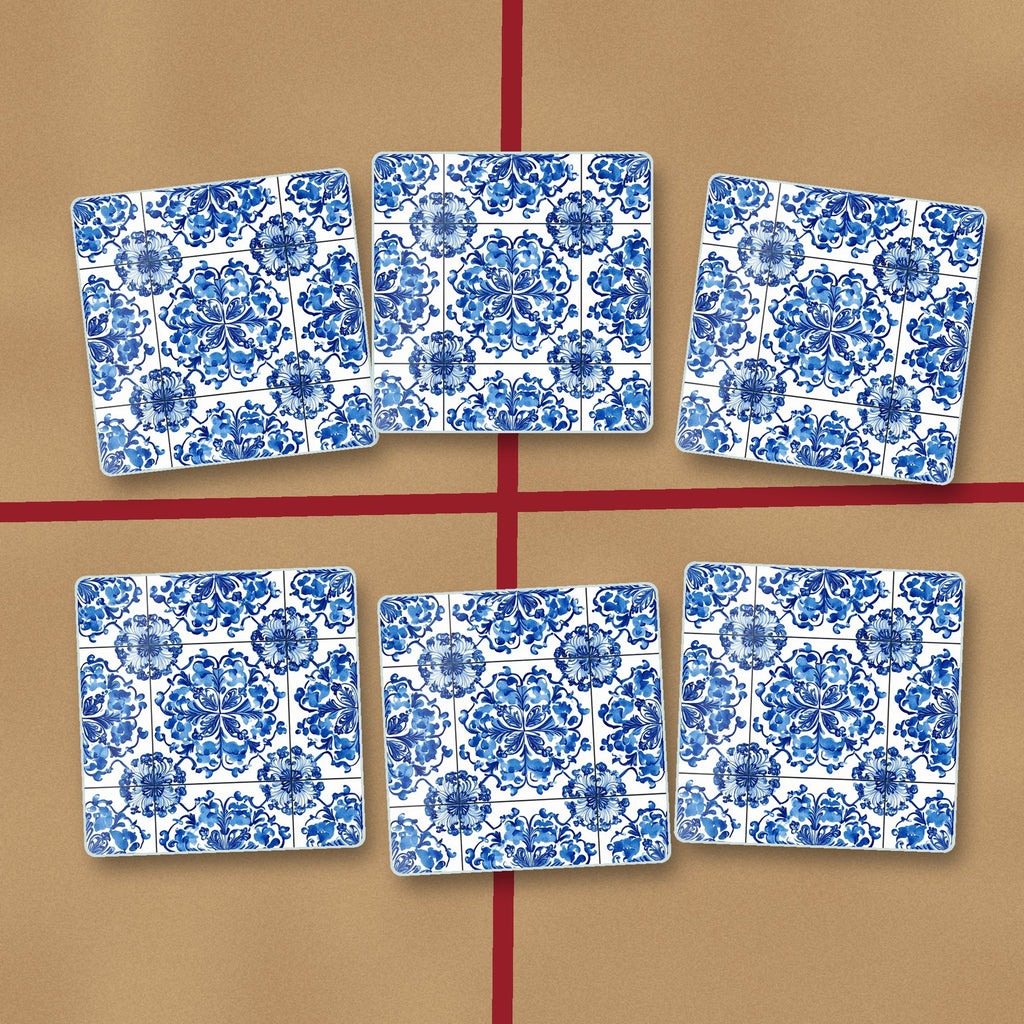 Blue & White Floral Tile square glass coasters on kraft gift wrap