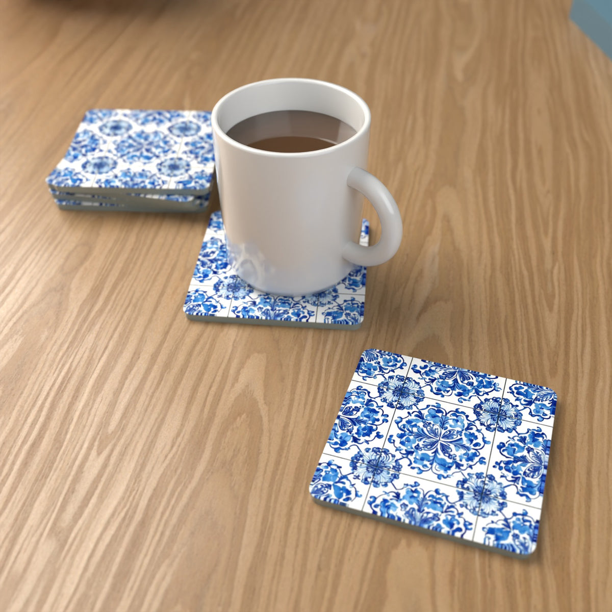 Blue & White Floral Tile Square Glass Coasters – Set of 6 – lifestyle mockup with a mug of coffee