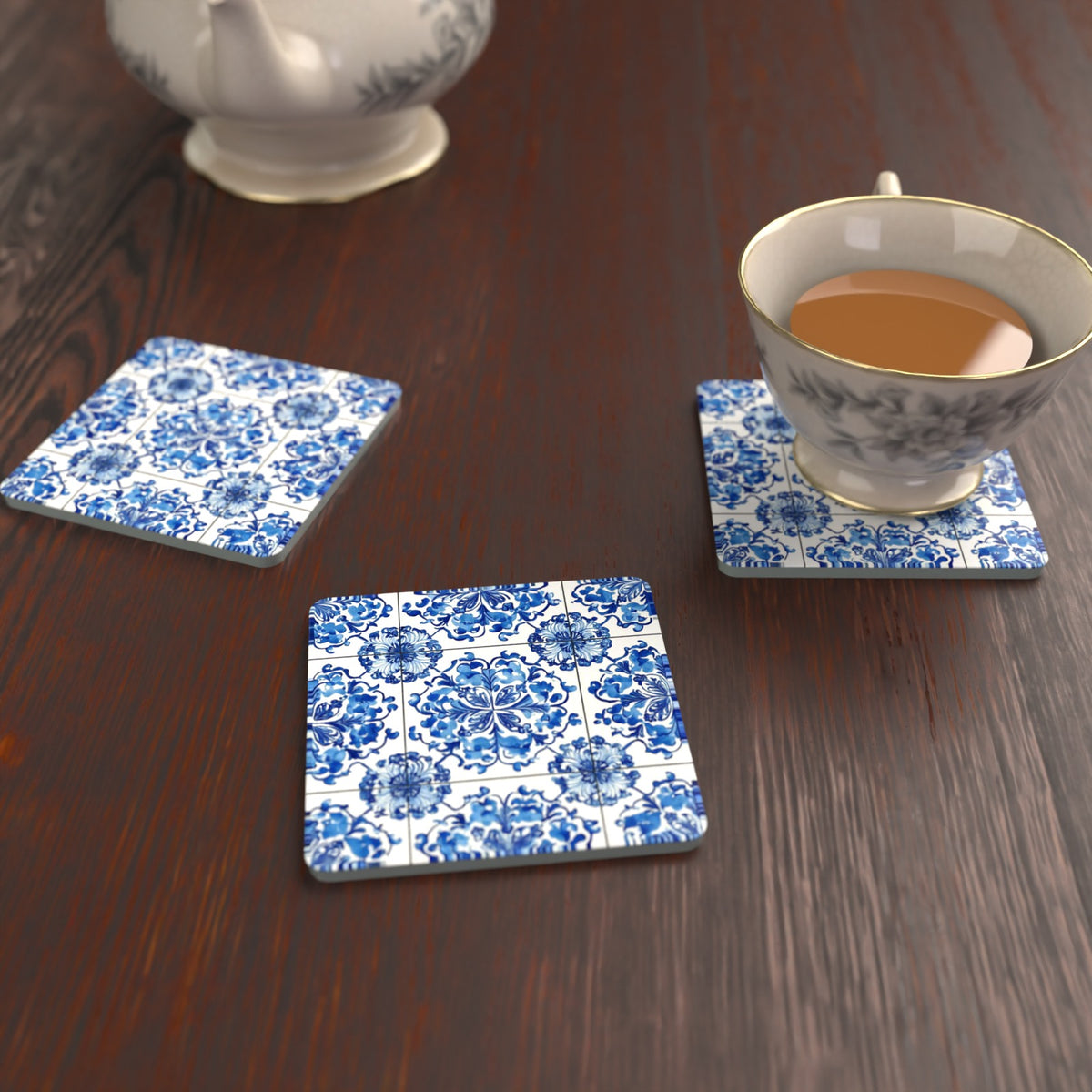 Blue & White Floral Tile Square Glass Coasters – Set of 6 – lifestyle mockup with a teacup
