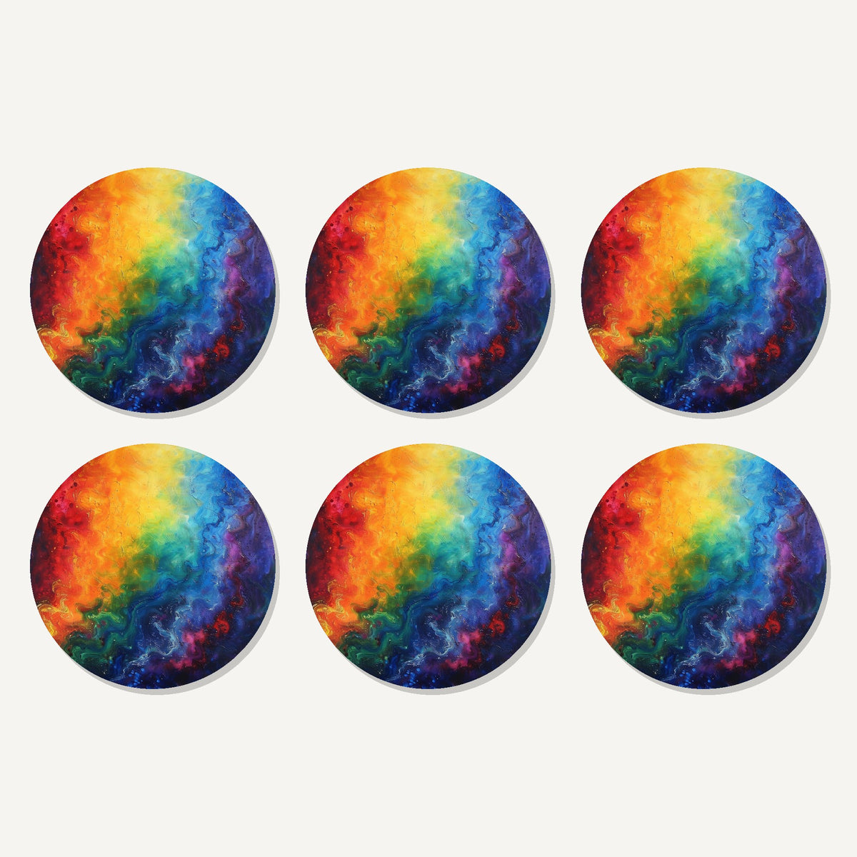Flat lay of the rainbow swirl abstract artwork on six round coasters