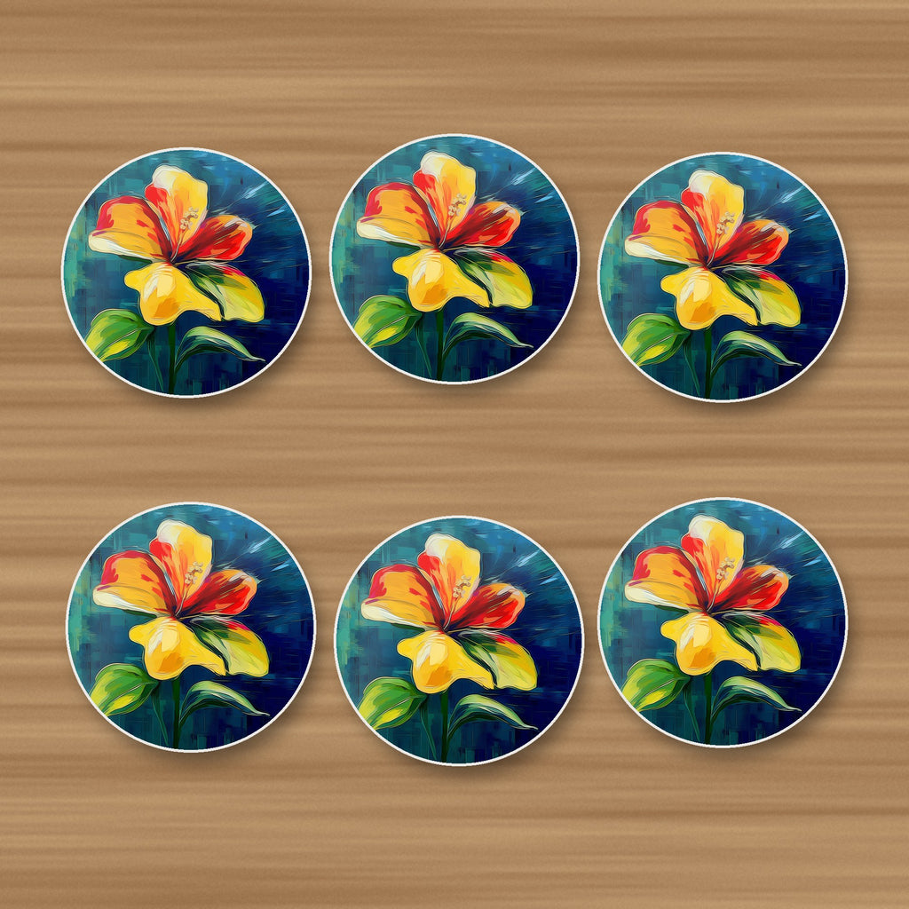 Painted Yellow & Red Flower round ceramic coasters, set of 6, on an oak coffee table