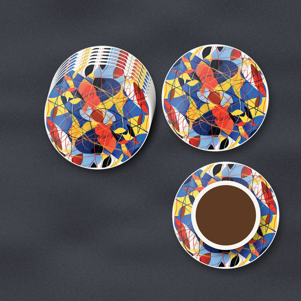 Abstract Lines & Shapes round ceramic coasters stacked on a slate kitchen worktop