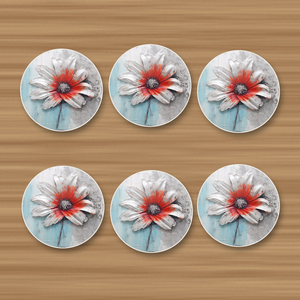 White & Red Flower on Pale Blue round ceramic coasters, set of 6, on an oak coffee table