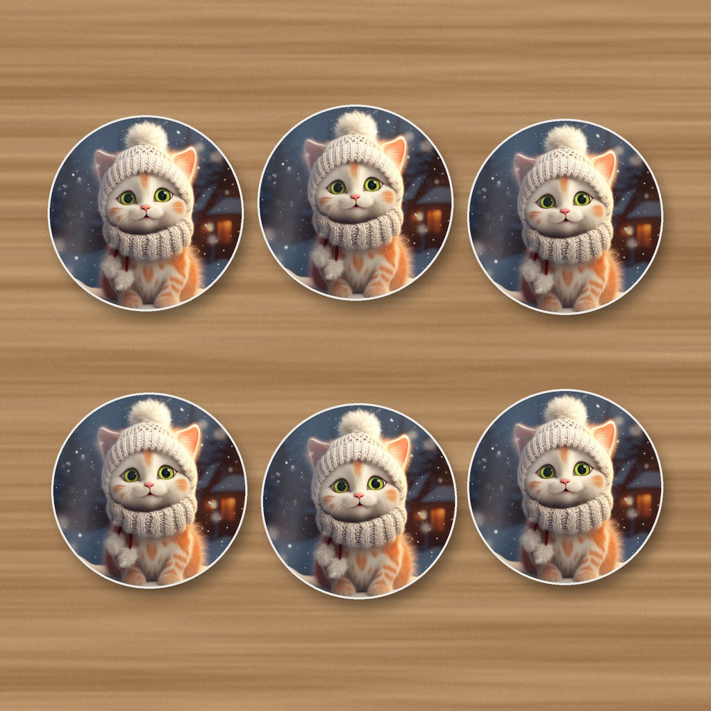 Kitten in a Knitted Bobble Hat round ceramic coasters, set of 6, on an oak coffee table
