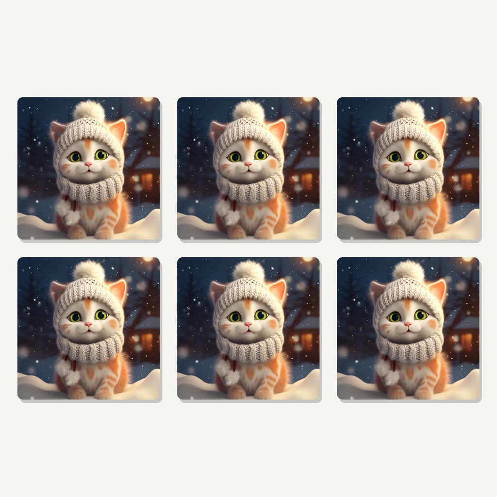 Flat lay of the kitten in a knitted bobble hat artwork on six square coasters