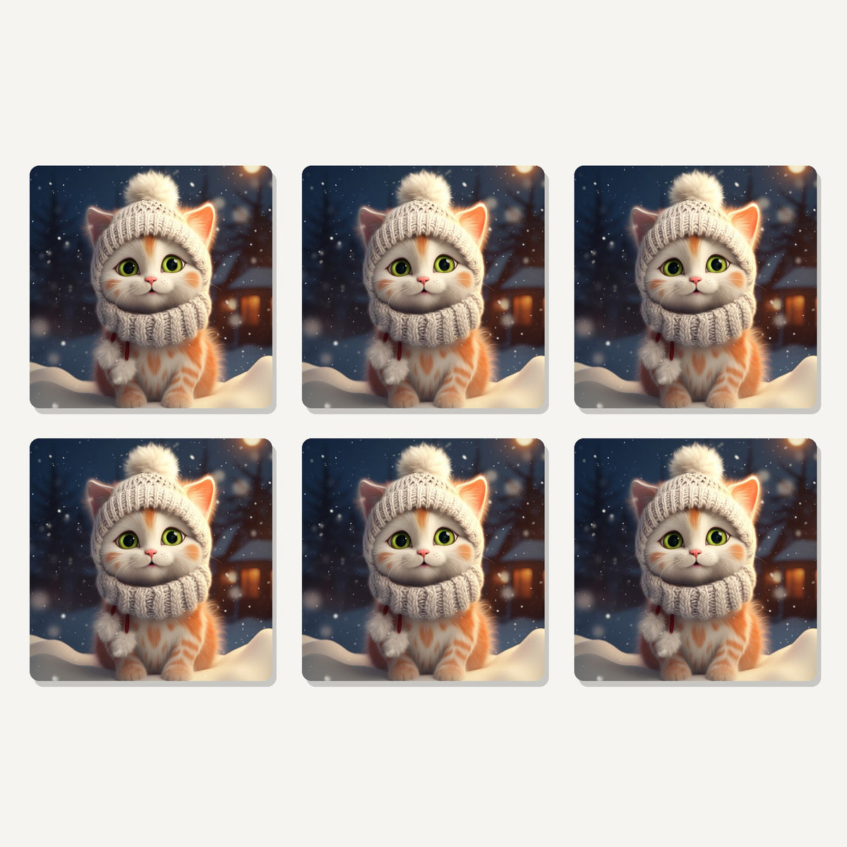 Flat lay of the kitten in a knitted bobble hat artwork on six square coasters