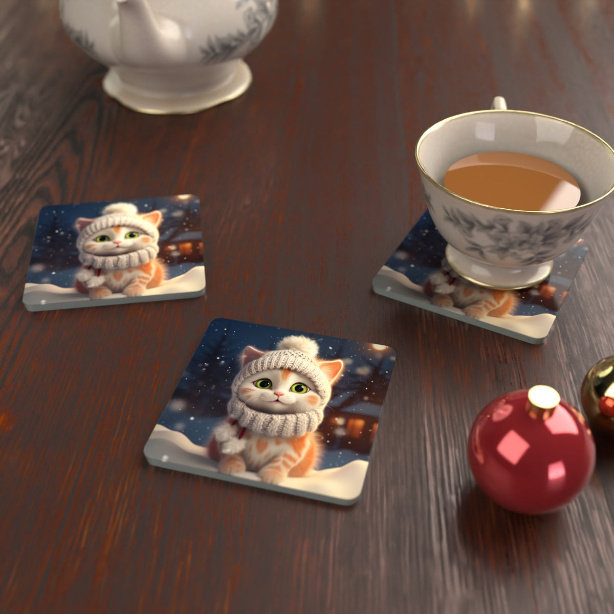 Kitten in a Knitted Bobble Hat Square Glass Coasters – Set of 6 – lifestyle mockup with a teacup