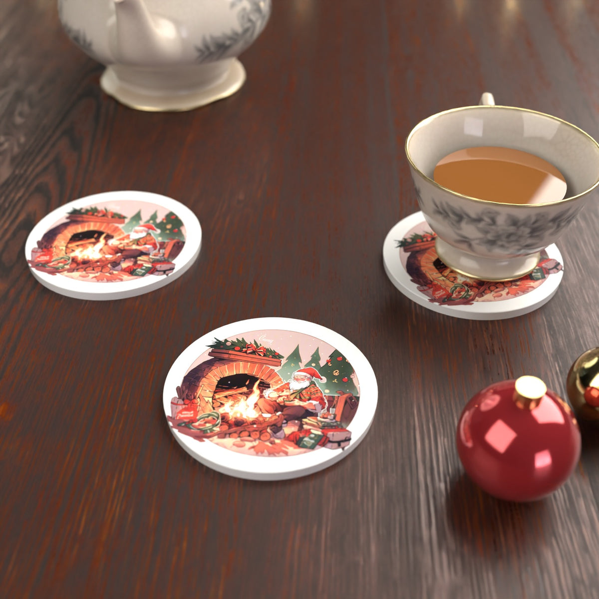 Father Christmas by the Fireside Round Ceramic Coasters – Set of 6 – lifestyle mockup with a teacup