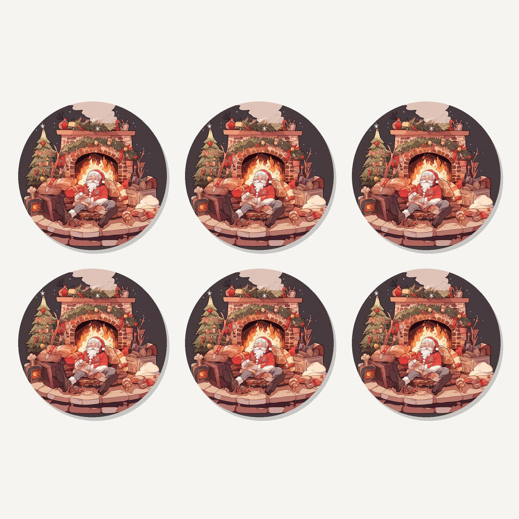 Flat lay of the father christmas fireside rest artwork on six round coasters