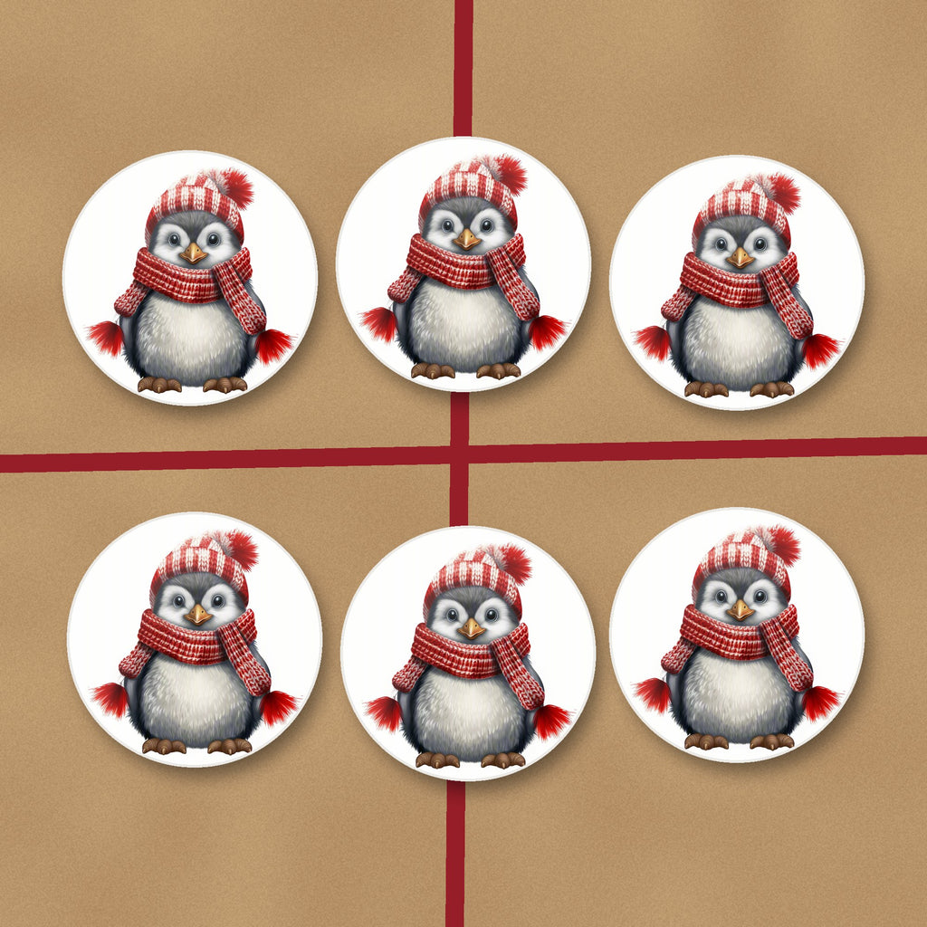 Penguin in a Red Bobble Hat round ceramic coasters on kraft gift wrap