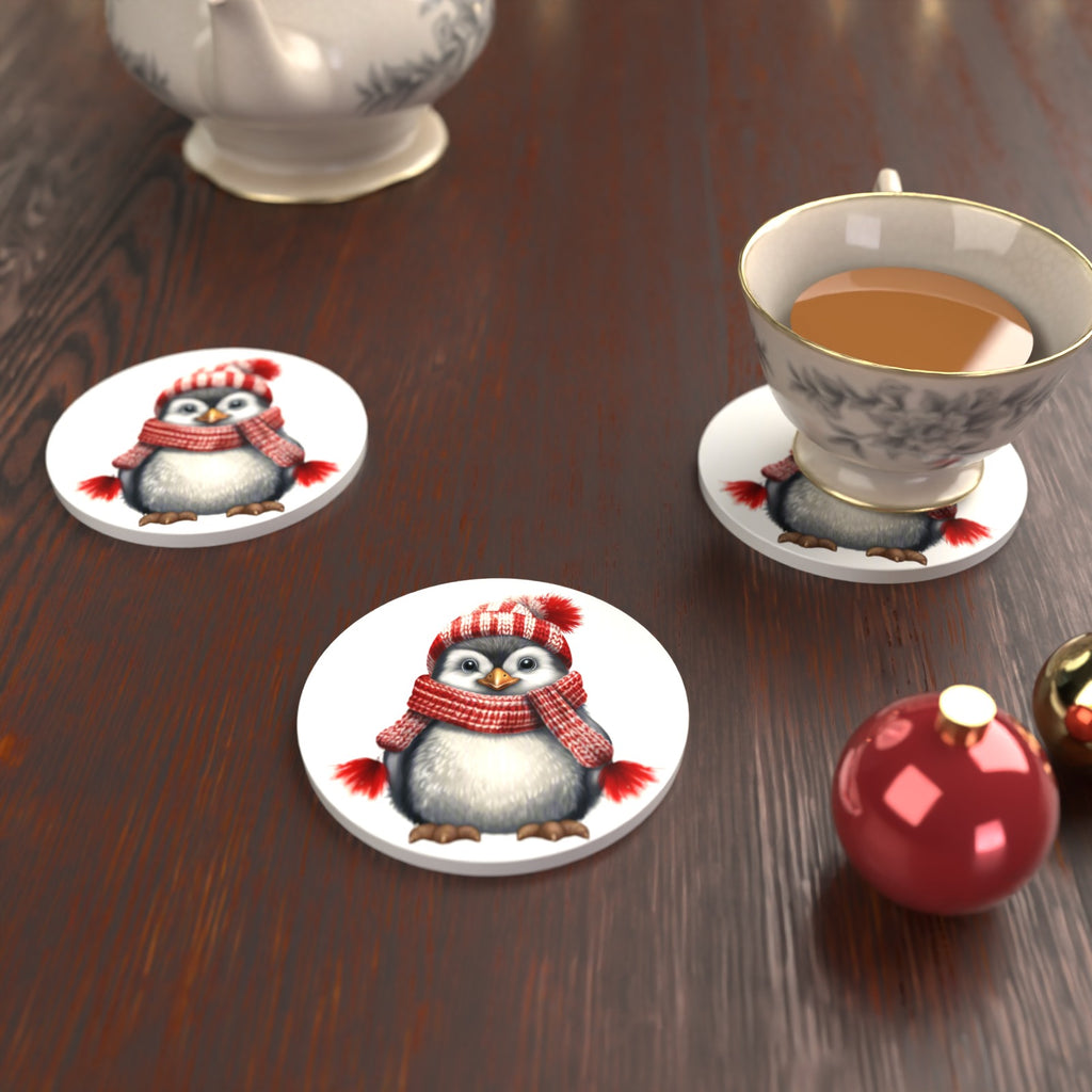 Penguin in a Red Bobble Hat Round Ceramic Coasters – Set of 6 – lifestyle mockup with a teacup