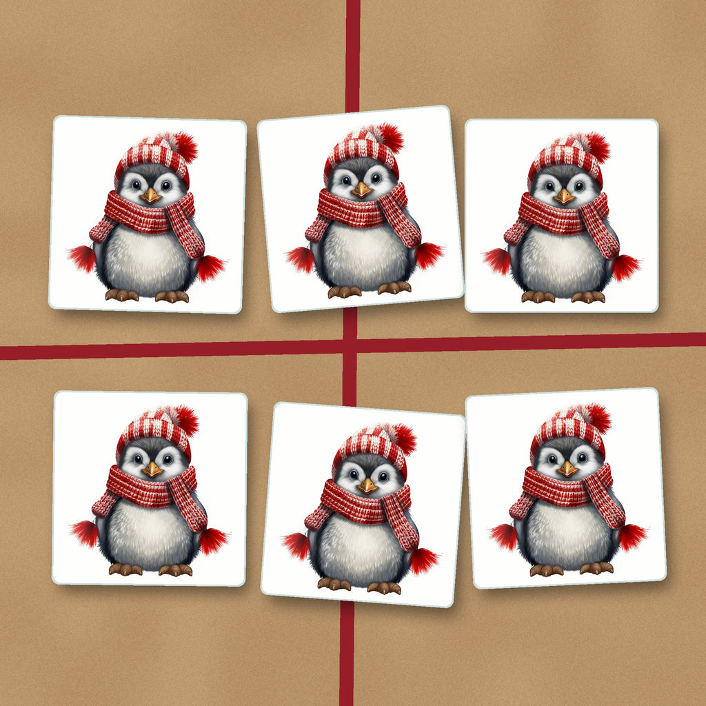 Penguin in a Red Bobble Hat square glass coasters on kraft gift wrap