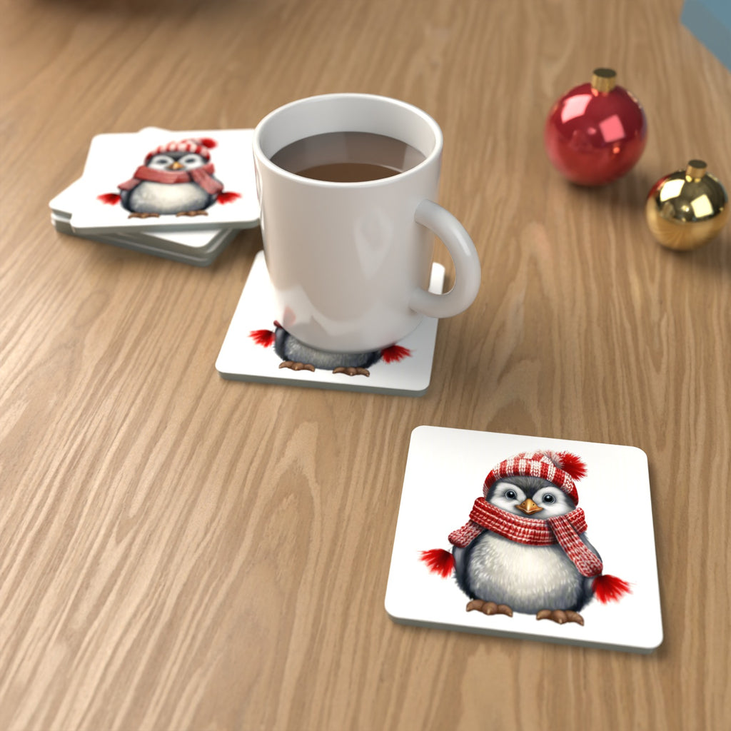 Penguin in a Red Bobble Hat Square Glass Coasters – Set of 6 – lifestyle mockup with a mug of coffee