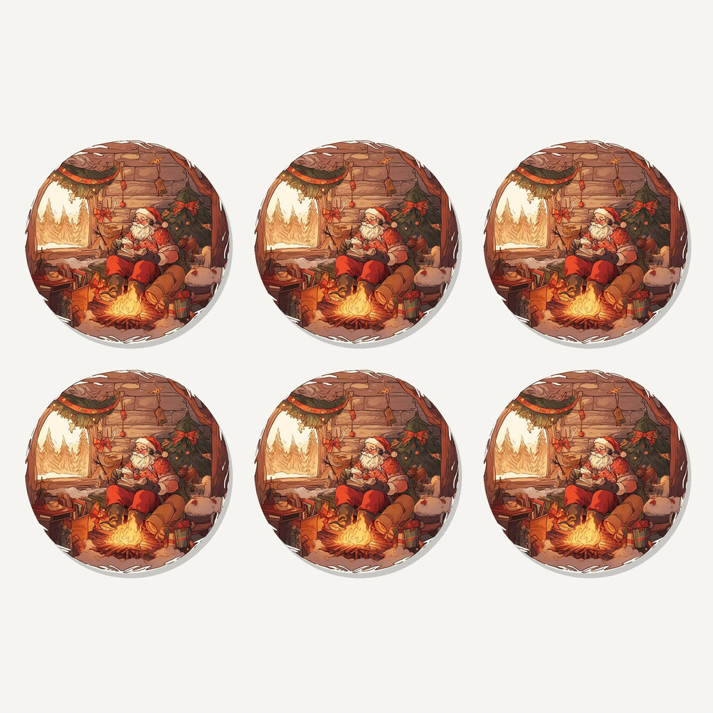 Flat lay of the father christmas cabin fireside artwork on six round coasters