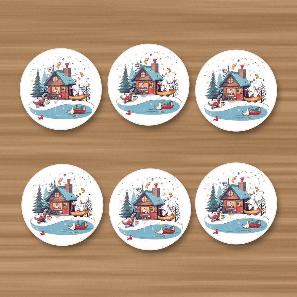 Christmas Cottage & Frozen Pond round ceramic coasters, set of 6, on an oak coffee table