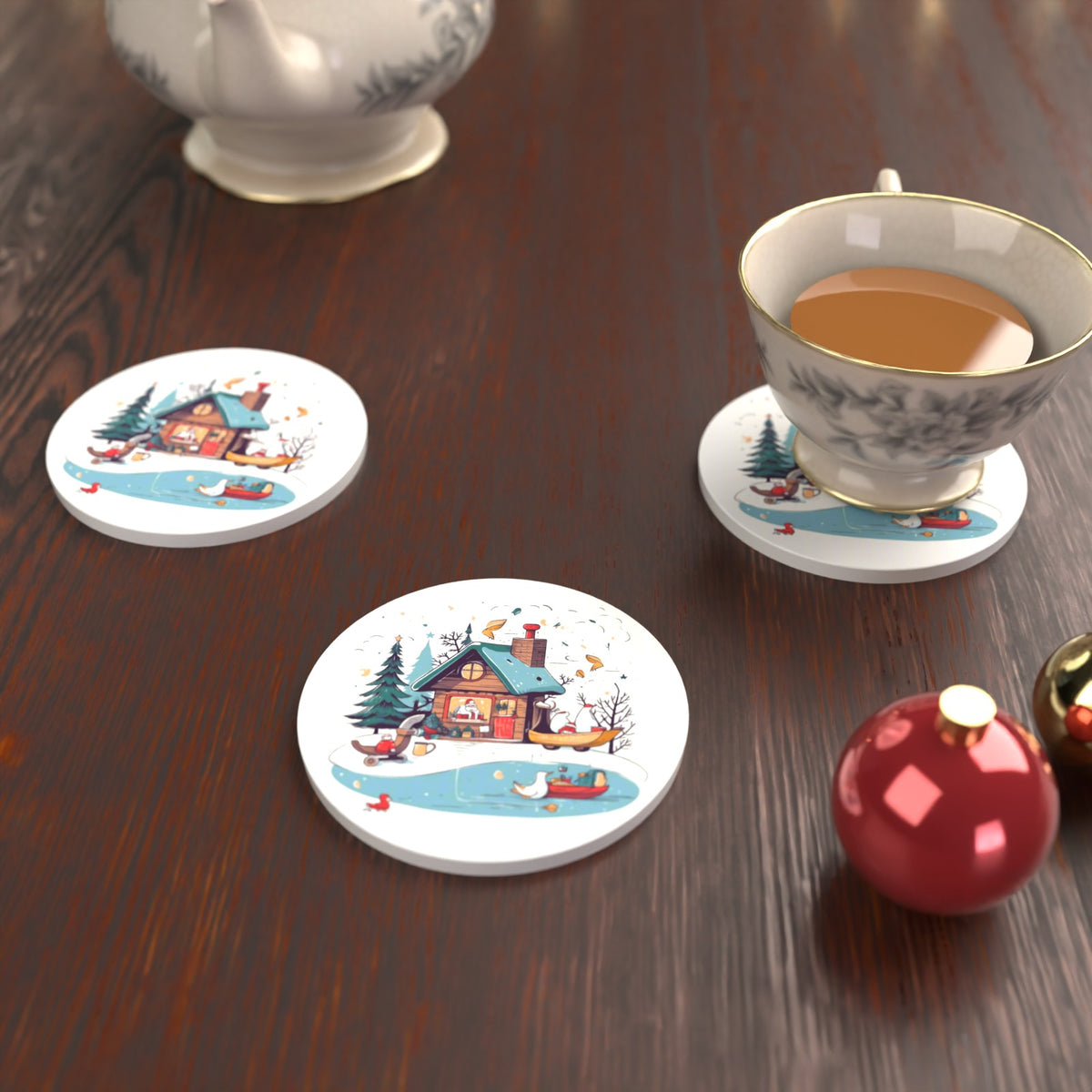Christmas Cottage & Frozen Pond Round Ceramic Coasters – Set of 6 – lifestyle mockup with a teacup