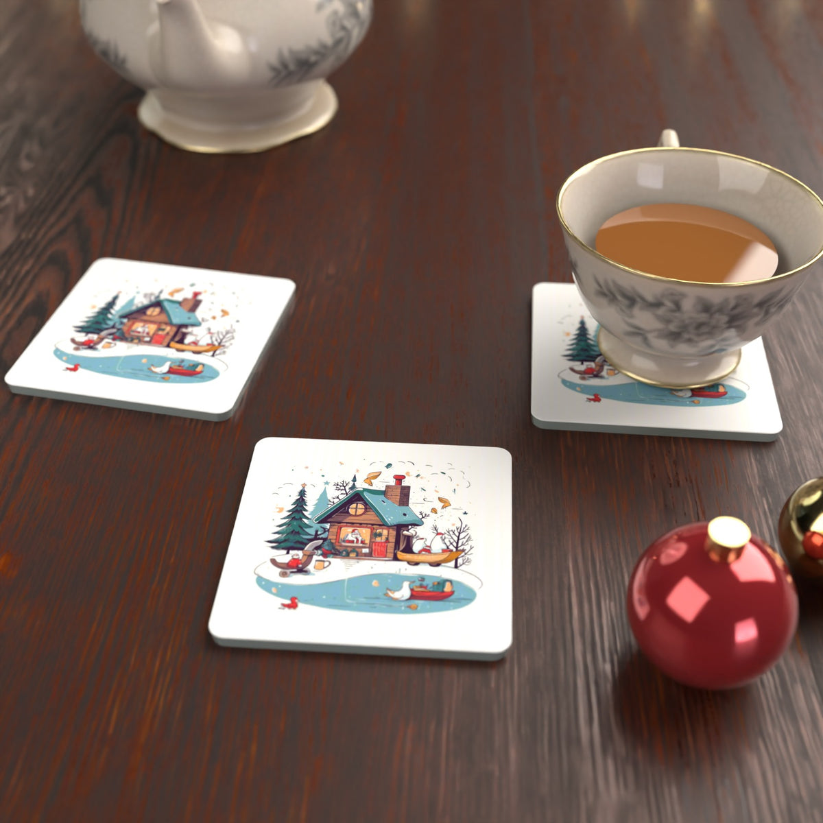 Christmas Cottage & Frozen Pond Square Glass Coasters – Set of 6 – lifestyle mockup with a teacup