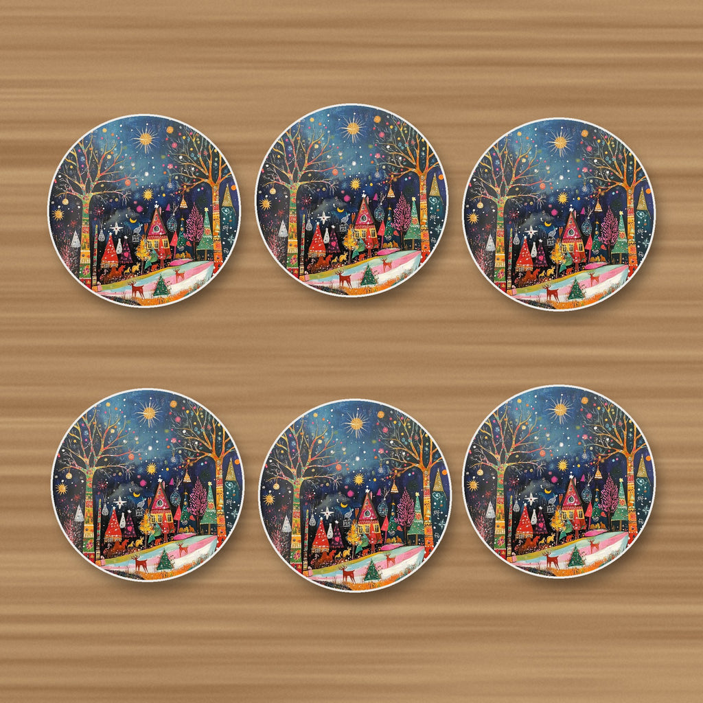 Folk Art Night Village round ceramic coasters, set of 6, on an oak coffee table