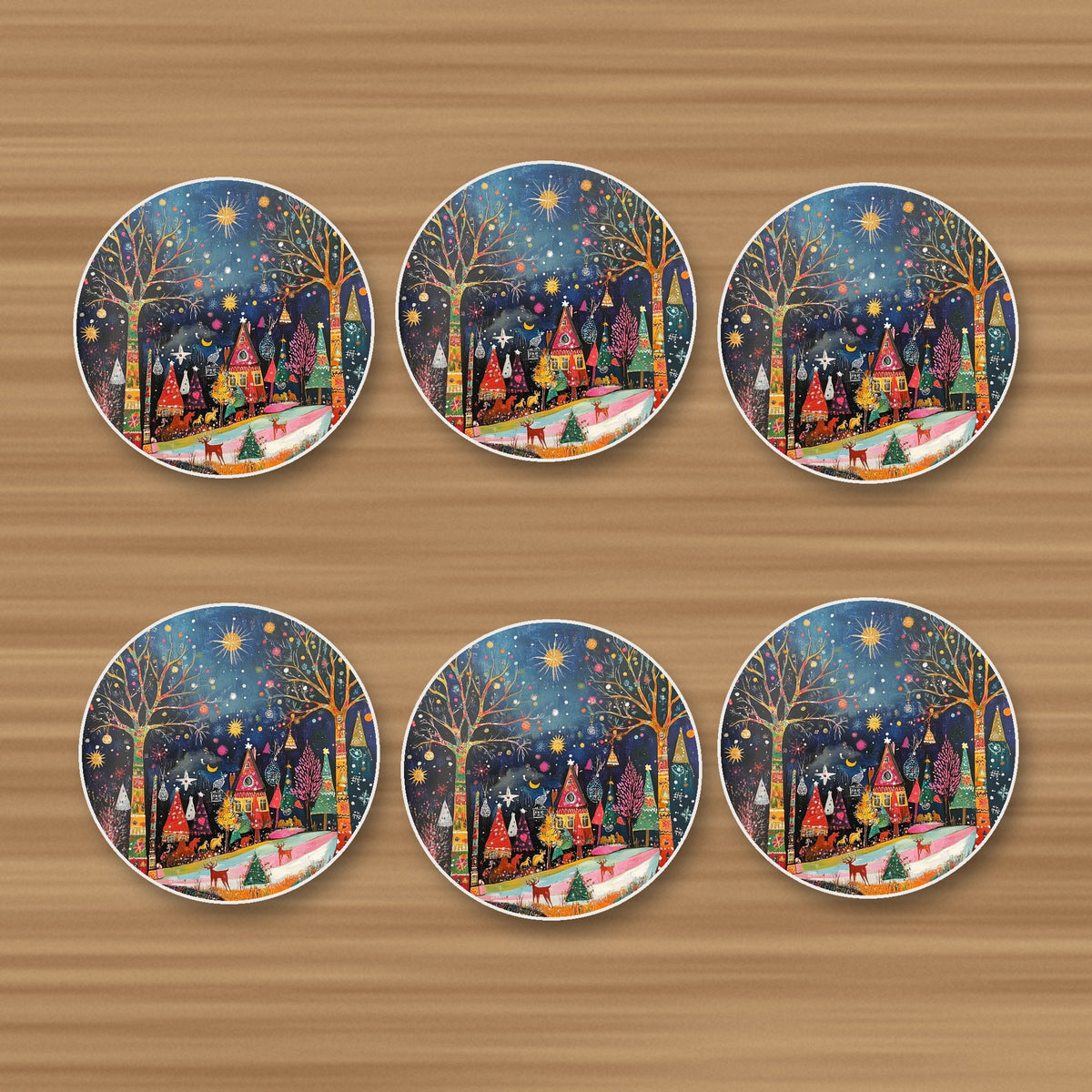 Folk Art Night Village round ceramic coasters, set of 6, on an oak coffee table