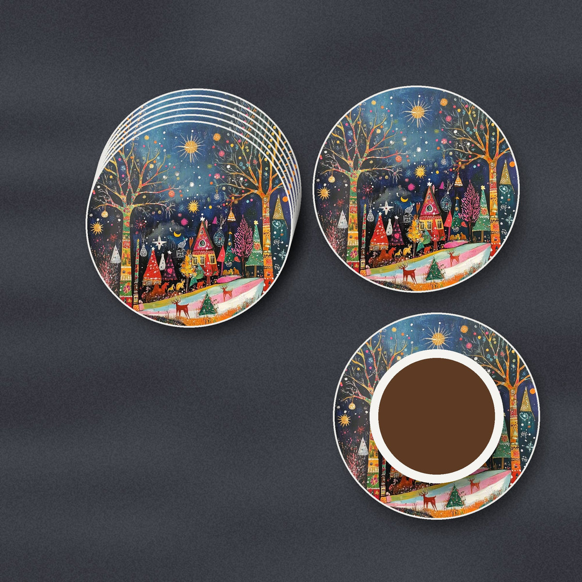 Folk Art Night Village round ceramic coasters stacked on a slate kitchen worktop