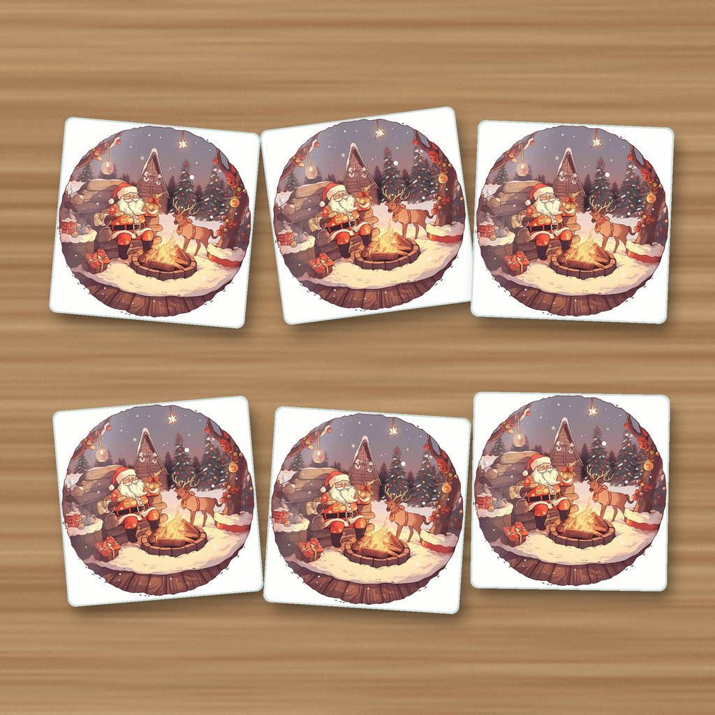 Father Christmas & Reindeer by the Campfire square glass coasters, set of 6, on an oak coffee table