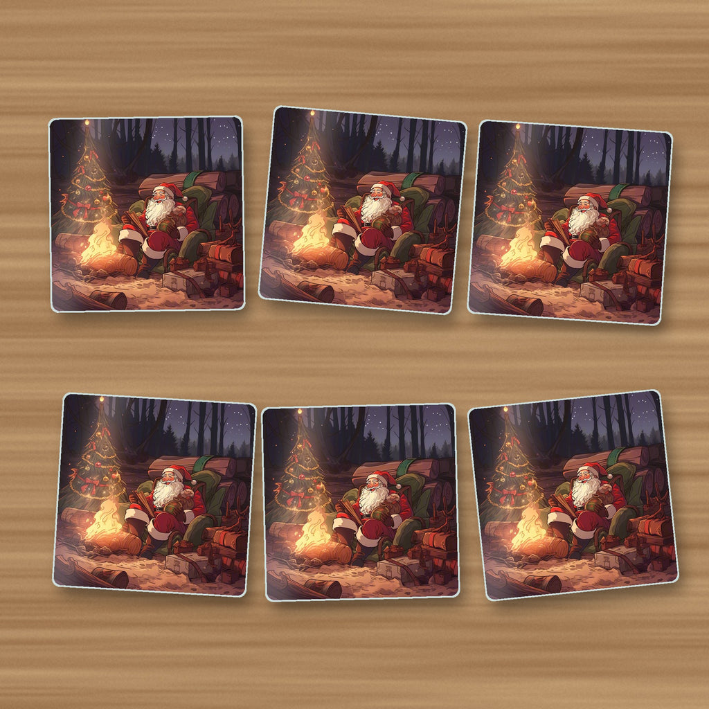 Father Christmas Forest Fireside square glass coasters, set of 6, on an oak coffee table