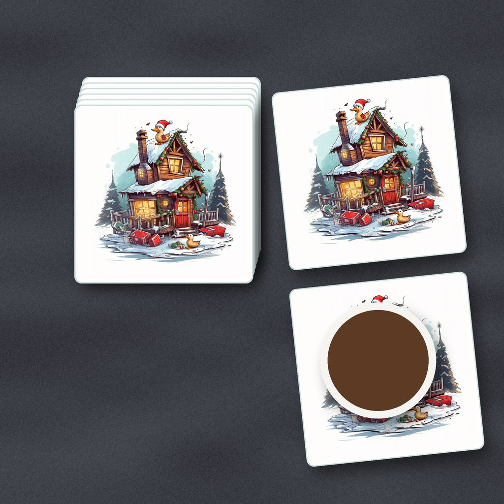 Snowy Log Cabin with Ducks square glass coasters stacked on a slate kitchen worktop