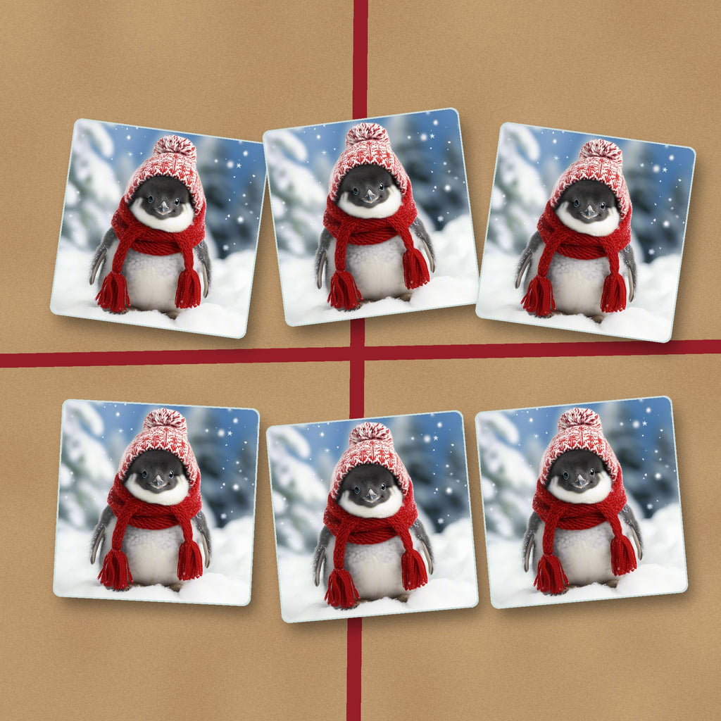 Penguin Chick in the Snow square glass coasters on kraft gift wrap