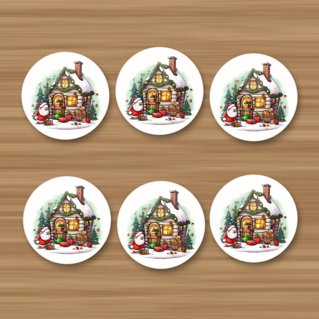 Christmas Cottage with Father Christmas round ceramic coasters, set of 6, on an oak coffee table