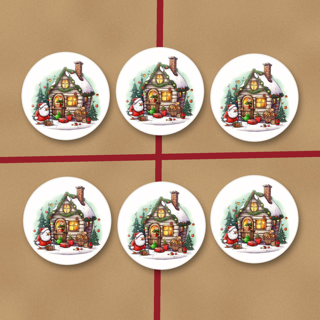 Christmas Cottage with Father Christmas round ceramic coasters on kraft gift wrap