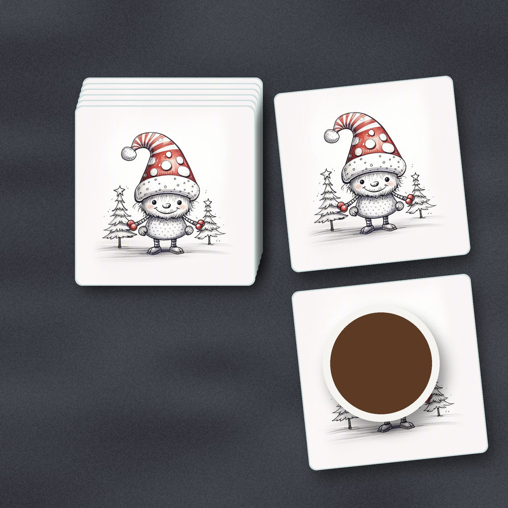 Sketch Snow Sprite in a Spotty Hat square glass coasters stacked on a slate kitchen worktop